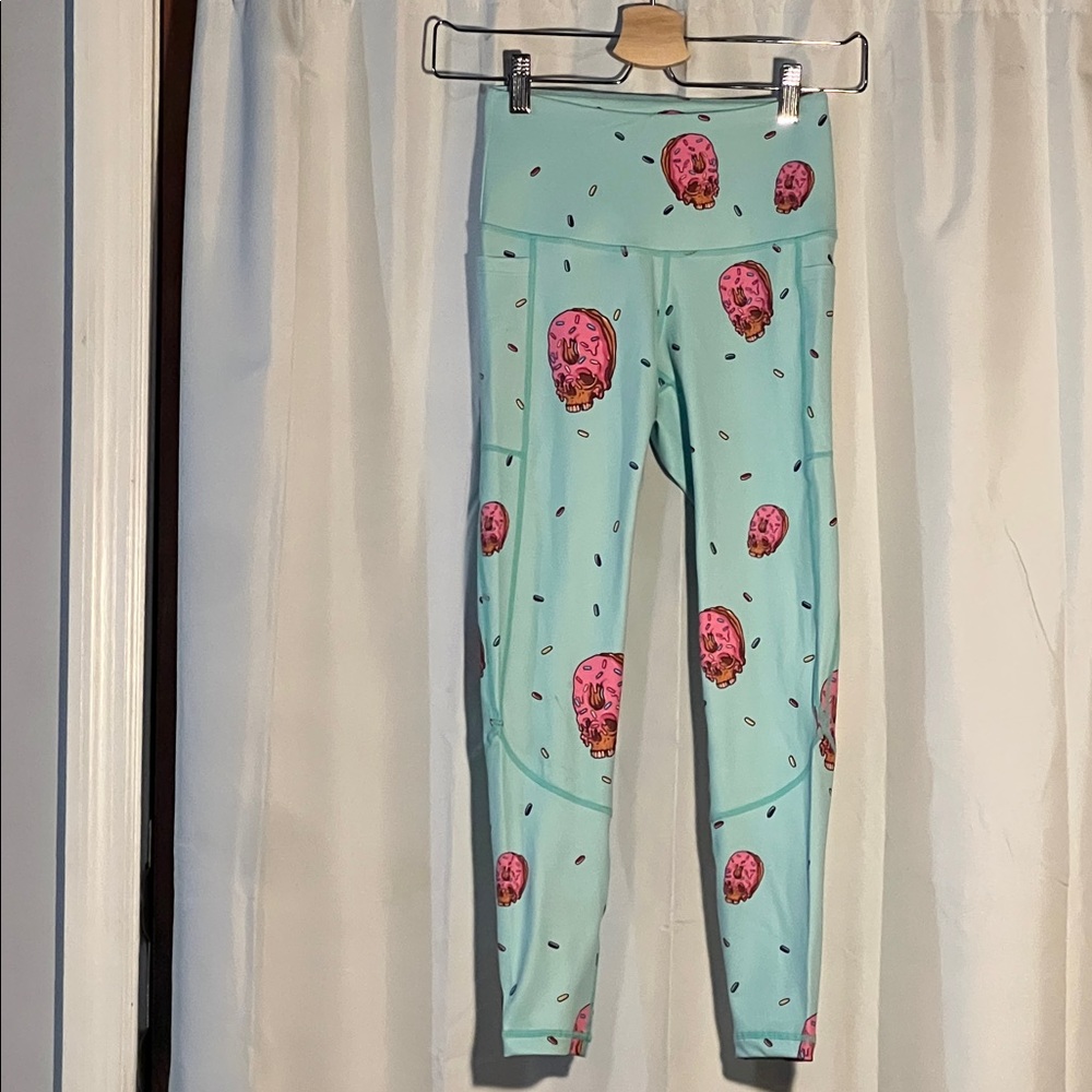 Feed Me Fight Me Aqua Leggings with Pink Donut Skull Design
